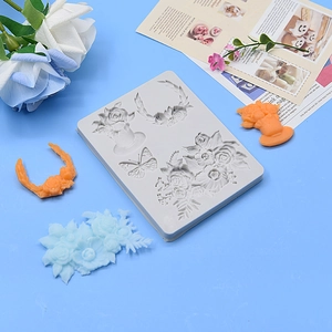 Graue Silikonform mit Schmetterlings- und Blumenmustern für Fondant- und Kuchendekoration