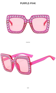 Front and side views of purple-pink square sunglasses featuring sparkling rhinestones
