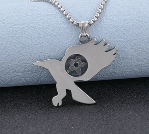 Detailed view of stainless steel eagle pentagram pendant with pearl chain necklace