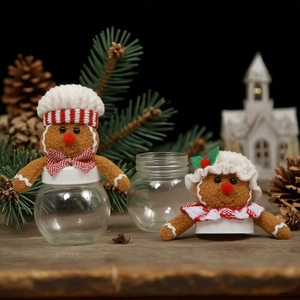 Cute gingerbread man chef candy jar with glass base and plush lid for Christmas decor