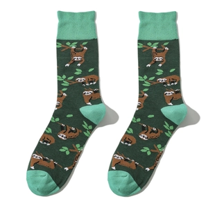 Detail of green mid-calf socks with sloth jacquard pattern and mint green accents