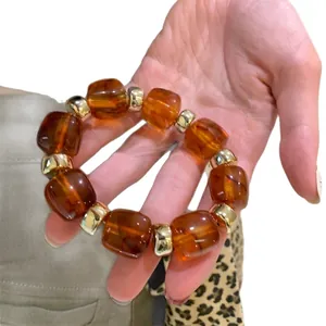 Vintage amber resin chunky beaded bracelet with square beads and gold metal spacers