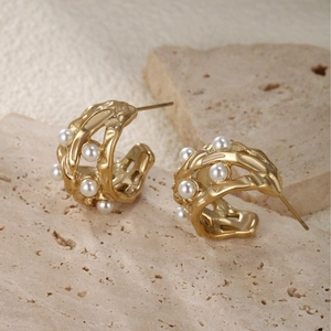 Gold hollow C-shape earrings with imitation pearls and irregular molten texture