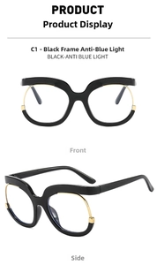 Detail view of large Y2K owl frame glasses with black rims and gold metal accents