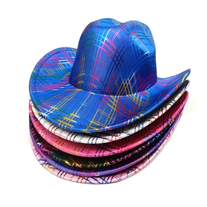 Close-up of holographic plaid western cowboy hats in vibrant rainbow metallic colors