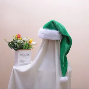 Forest green plush Christmas hat with soft white faux fur trim and pompom detail