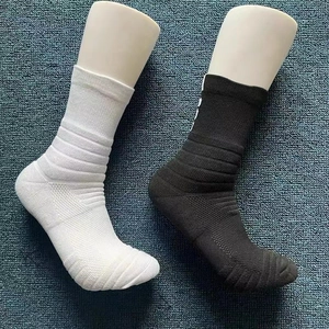 Detail of cushioned mid-calf sports socks with reinforced arch support and breathable texture