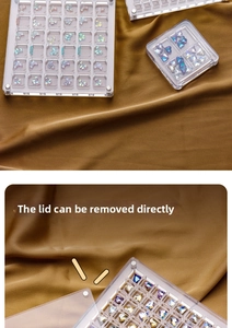 Detail showing the removable lid and grid layout of the clear acrylic nail art storage box