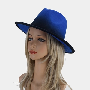 Detail view of stylish blue to black gradient felt fedora hat for autumn and winter fashion