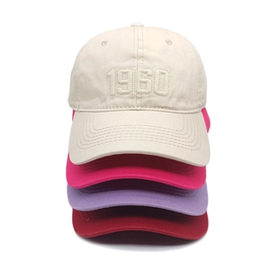 Detailed view of 1960 embroidered baseball caps in beige, rose, lilac and burgundy red