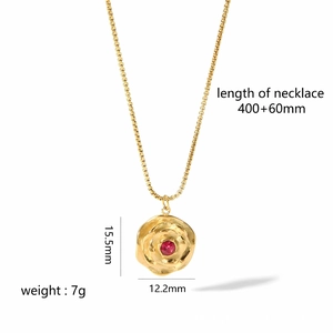 18K gold plated stainless steel necklace with textured flower pendant and red stone