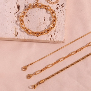 18K gold plated stainless steel chunky chain bracelet and layered necklaces on silk