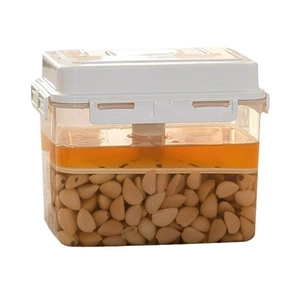 Press-type airtight kimchi container with a white sealing lid for kitchen food storage