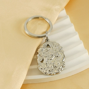 Embossed stainless steel dragon zodiac keychain with a polished silver finish for men