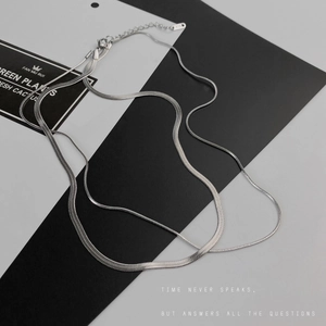 Minimalist silver double-layered snake bone chain necklace in shiny stainless steel