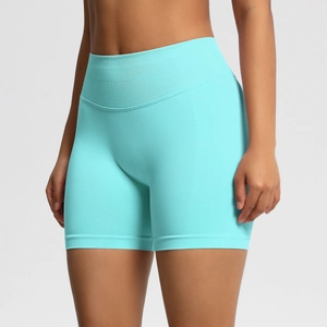 Détail du short de sport sans couture turquoise à taille haute montrant la texture côtelée