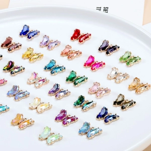 Colorful gradient crystal butterfly pendants in various colors with metal base settings