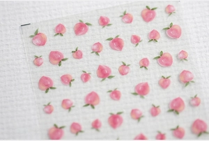 Détail de stickers à ongles 5D pêche avec des motifs de fruits à l'aquarelle translucide