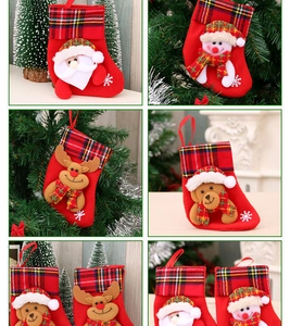Detail of Christmas stockings with 3D Santa, Snowman, Reindeer and Bear plush characters
