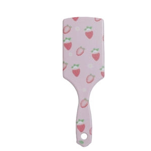 Pink square cushion hairbrush with strawberry print handle for scalp massage