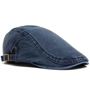Vintage washed navy cotton newsboy cap with adjustable bronze metal buckle side view
