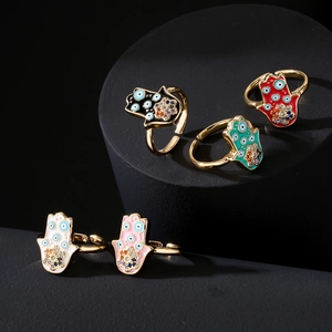 Adjustable gold plated Hamsa Hand and Evil Eye rings with colorful enamel and zircons