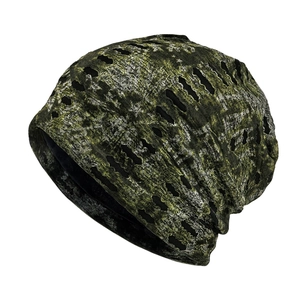 Distressed camouflage knit beanie with ripped details and warm lining for outdoor use