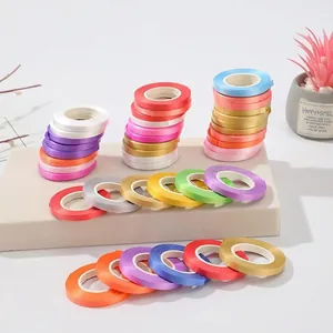 Colorful satin ribbon set for gift wrapping and DIY crafts with smooth glossy finish