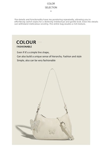 Detail of butterfly embossed cream shoulder bag with matching decorative charm and zipper