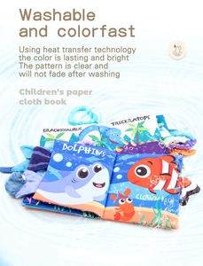 Detail of washable soft baby tail cloth book with ocean and dinosaur theme illustrations