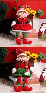 Close-up of plush Christmas elf couple dolls with red and green knitted hats and bells