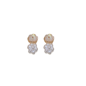 Elegant floral pearl earrings with pink translucent petals and golden clustered pearls