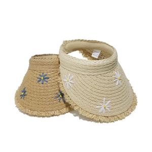 Lafia straw sun visor hat with daisy embroidery and fringed edges in cream and tan