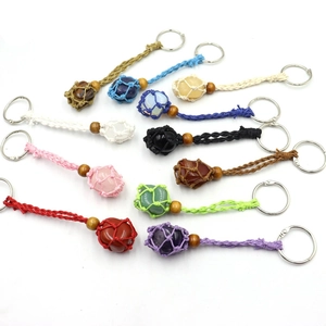 Macro view of adjustable woven mesh keychains with colorful crystal stones and beads