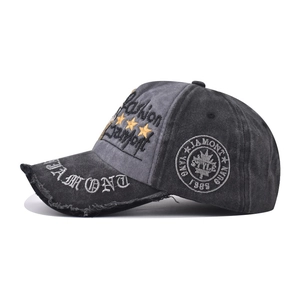 Classic washed charcoal baseball cap with vintage star embroidery and frayed brim