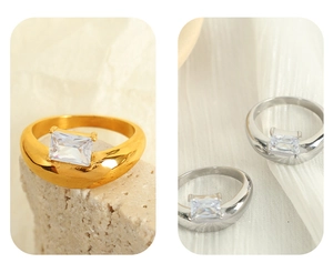 Detailed comparison of gold and silver minimalist rings with rectangular zircon stones