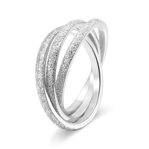 Detail view of interlocking three-ring bands with matte frosted finish and polished interior