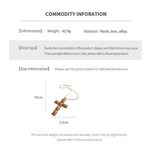 Detail shot of vintage resin cross pendant with adjustable twisted chain dimensions