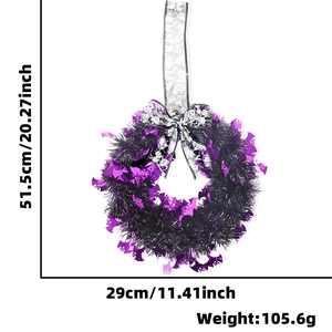 Detailed view of Halloween wreath with purple bats and silver bow including dimensions