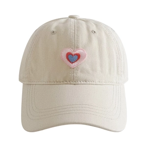 Beige baseball cap with colorful heart embroidery in a front view on white background