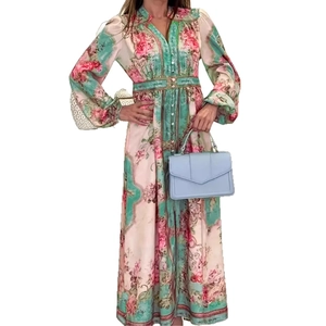 Floral maxi dress with long sleeves featuring pink and green vintage patterns and slim waist