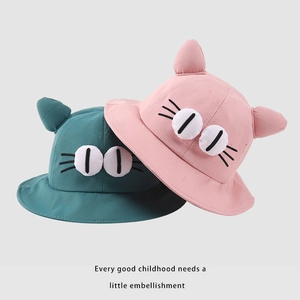 Cute kids cartoon bucket hats with cat ears and 3D eyes in pink and dark cyan