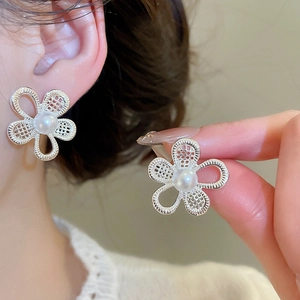 Elegant hollow flower earrings with white pearl center for women minimalist silver style