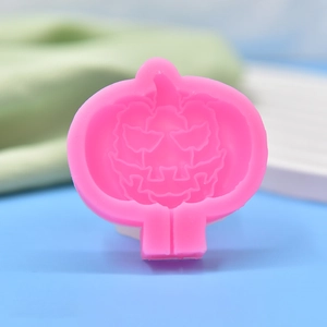 Pink silicone pumpkin mold for Halloween baking and DIY candle making projects