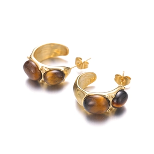 Golden C-shaped stainless steel earrings featuring two brown tiger eye natural stones