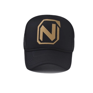 Detail of black trucker hat with golden N logo print and woven decorative rope on the brim