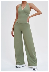 Sage green sports set featuring V-neck halter top and high-waist wide-leg pants
