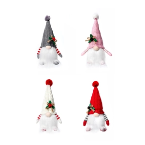 Set of four lighted Christmas gnomes with knitted hats and white beards on white background
