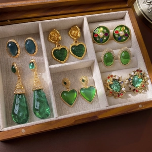 Vintage style green heart earrings and palace studs set in gold finish with pearls