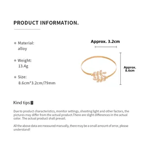 Detailed view of golden leaf arm cuff with size 8.6cm x 3.2cm and 13.4g weight specifications